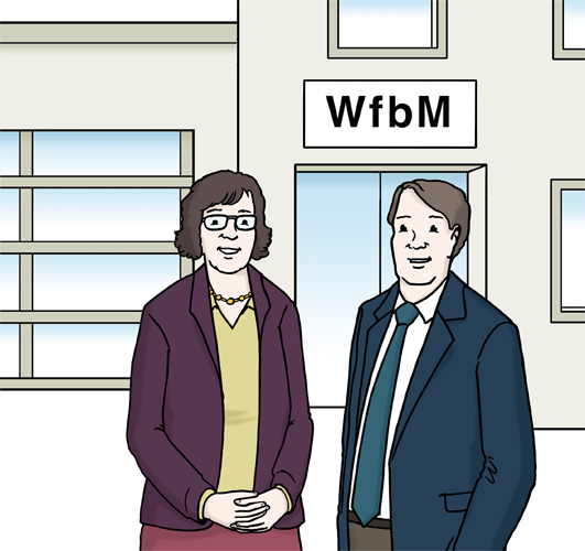 Auf dem Bild sind eine Frau und ein Mann zu sehen. Vor einer Werkstätte von Menschen mit Behinderung. Auf dem Bild sind eine Frau und ein Mann zu sehen. Vor einer Werkstätte von Menschen mit Behinderung.